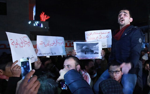 Jordanians take part in a demonstration near the US embassy in Amman, January 28, 2020, to protest against the US peace plan. (Khalil MAZRAAWI/AFP) Jordanians take part in a demonstration near the US embassy in Amman, January 28, 2020, to protest against the US peace plan. (Khalil MAZRAAWI/AFP)