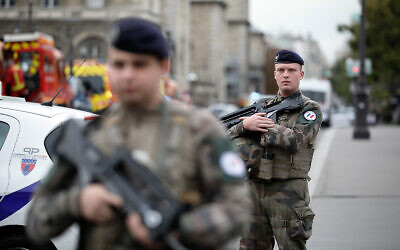 French soldiers on patrol after an incident at the police headquarters in Paris, October 3, 2019. (AP Photo/Kamil Zihnioglu)
