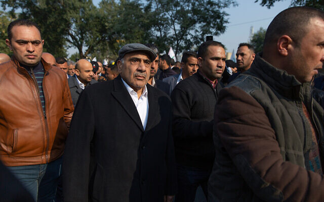 Iraqi acting Prime Minister Adel Abdel Mahdi takes part in the funeral of Iran's top general Qassem Soleimani in Baghdad, Iraq, January 4, 2020. (AP Photo/Nasser Nasser) Iraqi acting Prime Minister Adel Abdel Mahdi takes part in the funeral of Iran's top general Qassem Soleimani in Baghdad, Iraq, January 4, 2020. (AP Photo/Nasser Nasser)