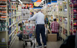 Illustrative: Israelis shop at a supermarket in Jerusalem, November 12, 2017. (Yonatan Sindel/Flash90)