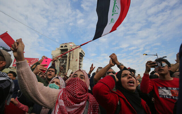 Iraqi anti-government demonstrators protest in Tahrir Square in the capital Baghdad, January 10, 2020. (AHMAD AL-RUBAYE/AFP) Iraqi anti-government demonstrators protest in Tahrir Square in the capital Baghdad, January 10, 2020. (AHMAD AL-RUBAYE/AFP)