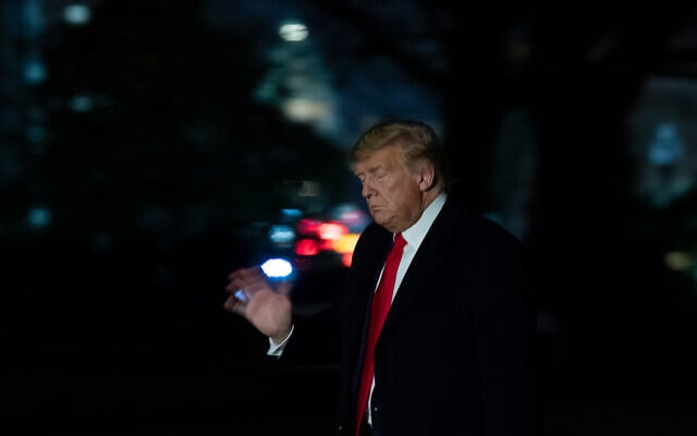 US President Donald Trump walks on the South Lawn of the White House, with the US Capitol in the background, Jan. 23, 2020, in Washington. (AP/Alex Brandon) US President Donald Trump walks on the South Lawn of the White House, with the US Capitol in the background, Jan. 23, 2020, in Washington. (AP/Alex Brandon)