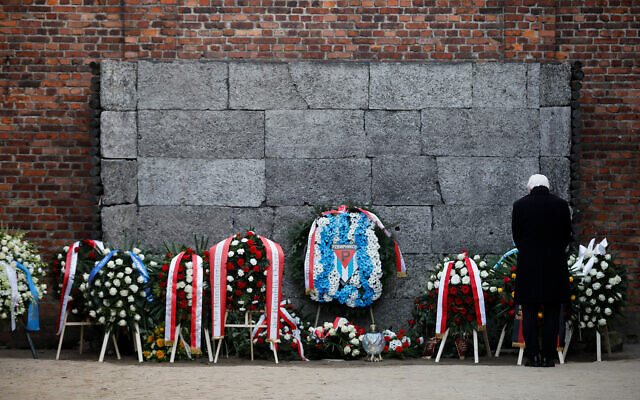 Germany's President Frank-Walter Steinmeier lays a wreath at the Death Wall at the Auschwitz I Nazi death camp in Oswiecim, Poland, Jan. 27, 2020. (AP/Markus Schreiber) Germany's President Frank-Walter Steinmeier lays a wreath at the Death Wall at the Auschwitz I Nazi death camp in Oswiecim, Poland, Jan. 27, 2020. (AP/Markus Schreiber)