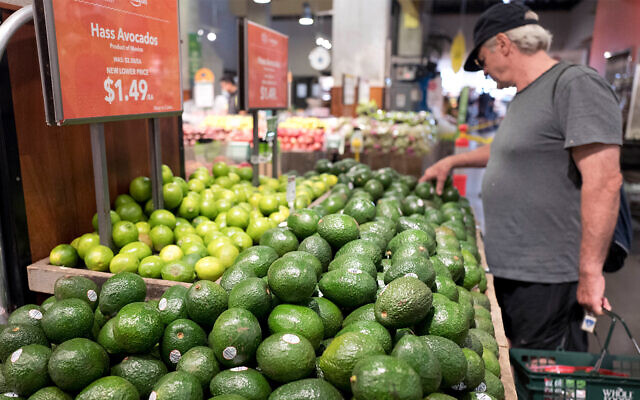 Illustrative: A man shops for avocados at a Whole Foods Market in New York, August 28, 2017. (AP/Mark Lennihan) Illustrative: A man shops for avocados at a Whole Foods Market in New York, August 28, 2017. (AP/Mark Lennihan)