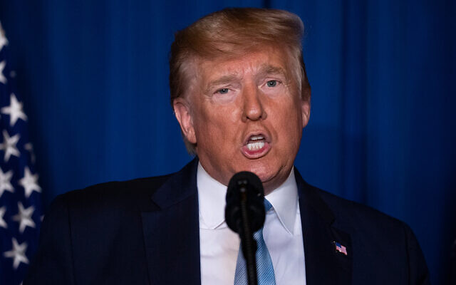 US President Donald Trump delivers remarks on Iran at his Florida Mar-a-Lago property, Jan. 3, 2020. (AP Photo/ Evan Vucci) US President Donald Trump delivers remarks on Iran at his Florida Mar-a-Lago property, Jan. 3, 2020. (AP Photo/ Evan Vucci)