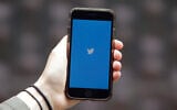 Illustrative: A phone showing the Twitter icon, July 10, 2019. (AP Photo/Jeff Chiu)
