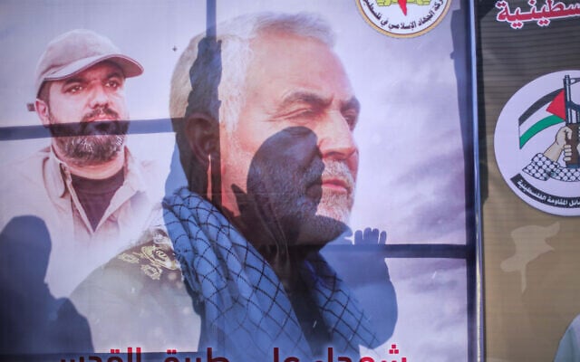 Palestinians walk next to posters of Qassem Soleimani in Gaza City, January 4, 2020. (Hassan Jedi/Flash90) Palestinians walk next to posters of Qassem Soleimani in Gaza City, January 4, 2020. (Hassan Jedi/Flash90)