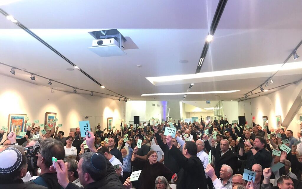 Jewish Home central committee members vote to approve a merger with the far-right Otzma Yehudit party on January 13, 2020 (courtesy) Jewish Home central committee members vote to approve a merger with the far-right Otzma Yehudit party on January 13, 2020 (courtesy)