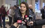 Screen capture from video of Yaffa Issachar, whose daughter Naama was jailed in Russia for tax offenses, seen arriving at Ben Gurion Airport, Israel, January 19, 2020. (Channel 12 news)