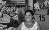 A girl and her bananas, from 'Emerging from the Shadows' exhibit at Beit Avi Chai, through June 2020 (Courtesy Sarah Ayal)