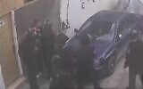 Border Police seen beating an Arab East Jerusalemite, who works as a security guard for the Jerusalem light rail, in East Jerusalem (Screencapture / Channel 13, January 13, 2019)