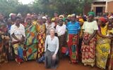 The women’s cooperative of the village of Mubuga which is set to benefit from productive uses of solar power as part of a social and economic development program.  Dr. Hanna Klein (center), VP for Research and Project Development of Gigawatt Global is planning to switch the power to the village's flour mills from diesel to solar-powered electricity.  (Courtesy)