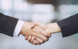 Illustrative image of a handshake (Rattankun Thongbun, iStock by Getty Images)