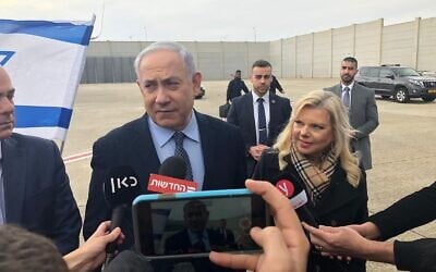 Prime Minister Benjamin Netanyahu speaks with media before flying to Greece to sign a major natural gas supply deal, January 2, 2019. (Shalom Yerushalmi/Times of Israel)