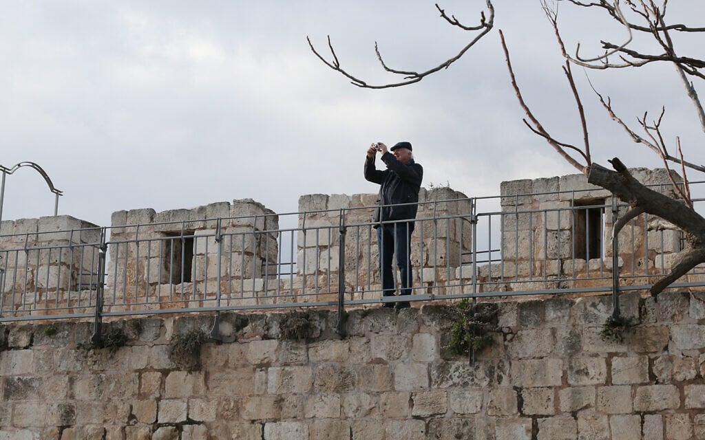 A visitor on a newly-opened section of Jerusalem's Old City ramparts. (Shmuel Bar-Am)