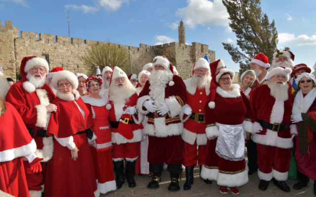 Some of 47 Santas and Mrs. Clauses visiting Jerusalem in January 2020 on a Ministry of Tourism trip (Courtesy Israel Ministry of Tourism)