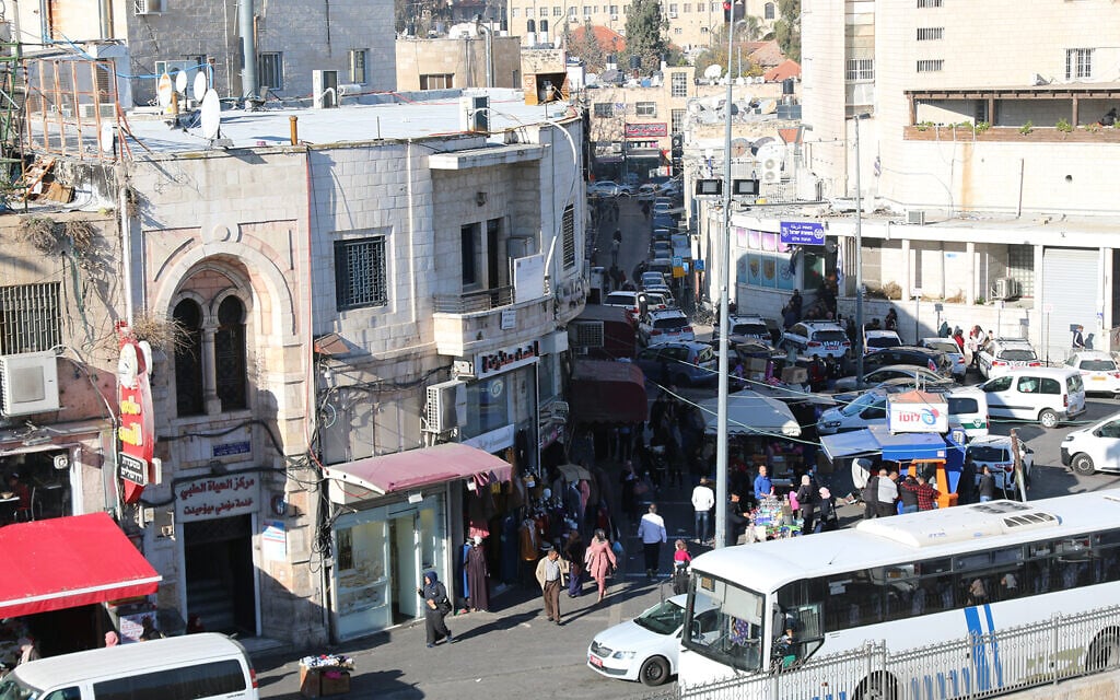 Suleiman and Saladin streets in busy East Jerusalem, seen from the Old City walls. (Shmuel Bar-Am)