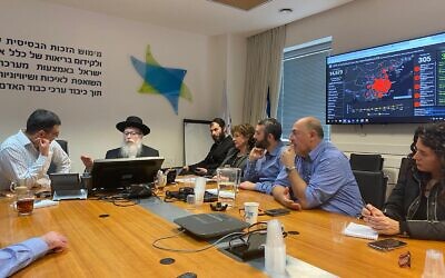 Illustrative: Health Minister Yaakov Litzman (2L) and Health Ministry officials during a meeting on the threat of the Chinese coronavirus, at the Health Ministry in Jerusalem, February 2, 2020. (Health Ministry/courtesy)
