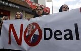 Arab Israelis take part in a rally to express their opposition to the US-brokered proposal for a settlement of the Middle East conflict, in the Arab-Israeli town of Baqa al-Gharbiya in northern Israel on February 1, 2020. (Ahmad GHARABLI / AFP)