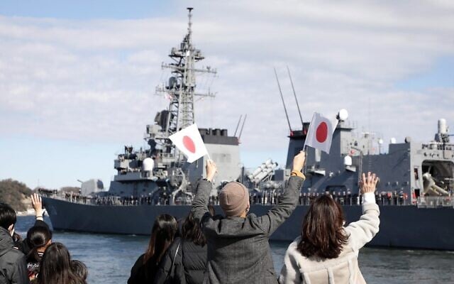 People wave as Japan's Maritime Self-Defense Force destroyer "Takanami" leaves for the Middle East at Yokosuka Naval Base in Yokosuka, Kanagawa prefecture on February 2, 2020. (Photo by STR / JIJI PRESS / AFP) People wave as Japan's Maritime Self-Defense Force destroyer "Takanami" leaves for the Middle East at Yokosuka Naval Base in Yokosuka, Kanagawa prefecture on February 2, 2020. (Photo by STR / JIJI PRESS / AFP)