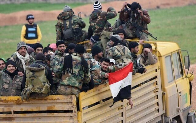 Syrian army soldiers advance in Tall Sultan town towards Saraqeb city, in Syria's northwestern Idlib province, on February 5, 2020. (AFP) Syrian army soldiers advance in Tall Sultan town towards Saraqeb city, in Syria's northwestern Idlib province, on February 5, 2020. (AFP)