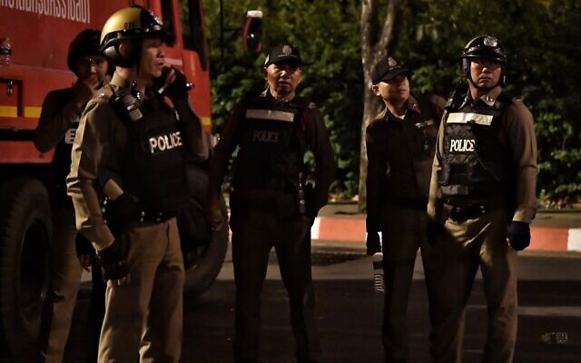 Illustrative: Police stand outside the Terminal 21 shopping mall where a mass shooting took place, on February 9, 2020, in the Thai northeastern city of Nakhon Ratchasima. (Lillian SUWANRUMPHA / AFP)