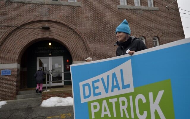 A supporter of Democratic presidential contender Deval Patrick stands outside the Ward Five Community Center during the New Hampshire primary in Concord, New Hampshire on February 11, 2020. (Joseph Prezioso/AFP) A supporter of Democratic presidential contender Deval Patrick stands outside the Ward Five Community Center during the New Hampshire primary in Concord, New Hampshire on February 11, 2020. (Joseph Prezioso/AFP)