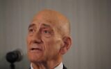 Former Israeli prime minister Ehud Olmert speaks at a briefing at UN headquarters in New York with Palestinian Authority President Mahmoud Abbas on February 11, 2020. (Bryan R. Smith/AFP)