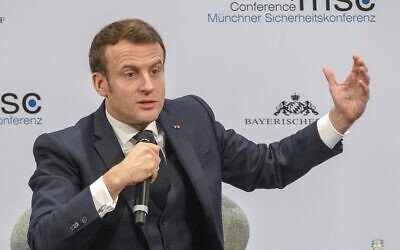 Illustrative: France's President Emmanuel Macron addresses the audience on the podium during the 56th Munich Security Conference (MSC) in Munich, southern Germany, on February 15, 2020 (Christof STACHE / AFP)