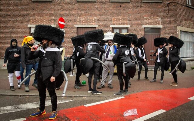 Revellers dressed as ultra-Orthodox Jews are pictured prior the start of the Aalst Carnival's on February 23, 2020, Aalst, Belgium. (JAMES ARTHUR GEKIERE / AFP) Revellers dressed as ultra-Orthodox Jews are pictured prior the start of the Aalst Carnival's on February 23, 2020, Aalst, Belgium. (JAMES ARTHUR GEKIERE / AFP)