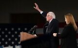 Democratic presidential candidate Sen. Bernie Sanders, with wife Jane Sanders (R), addresses supporters during his caucus night watch party on February 3, 2020, in Des Moines, Iowa (Joe Raedle/Getty Images/AFP)