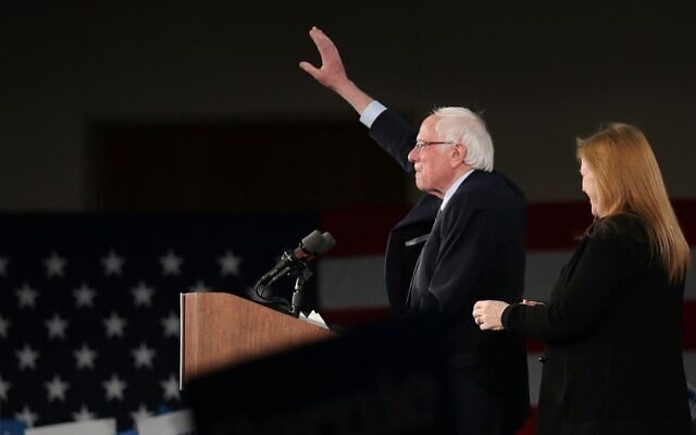 Democratic presidential candidate Sen. Bernie Sanders, with wife Jane Sanders (R), addresses supporters during his caucus night watch party on February 3, 2020, in Des Moines, Iowa (Joe Raedle/Getty Images/AFP) Democratic presidential candidate Sen. Bernie Sanders, with wife Jane Sanders (R), addresses supporters during his caucus night watch party on February 3, 2020, in Des Moines, Iowa (Joe Raedle/Getty Images/AFP)