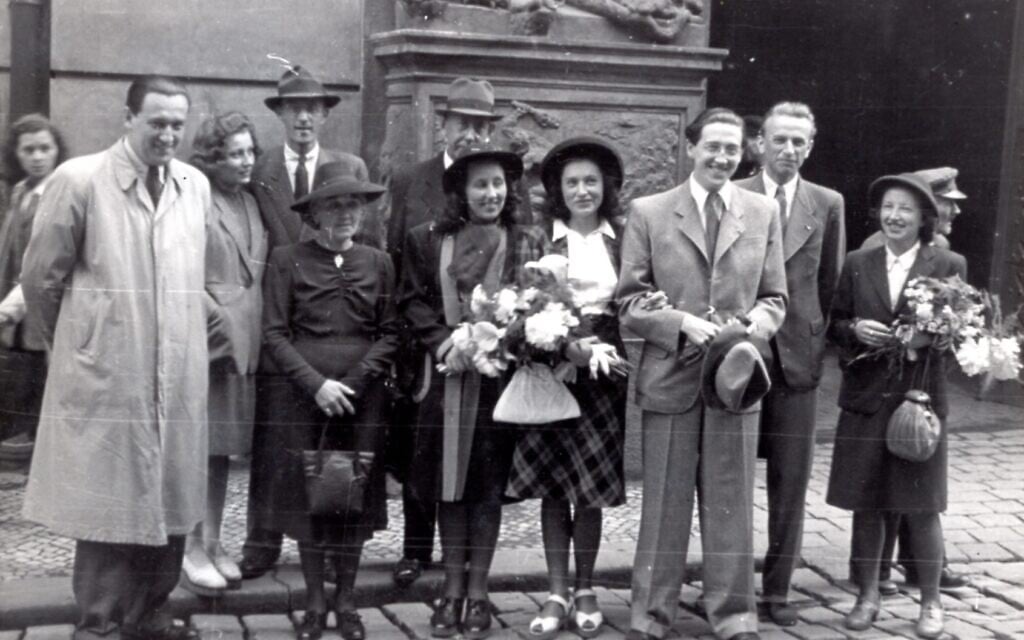 Wedding of Hans Neumann (third from right) to his first wife Mila (fourth from right) in Prague, June 2, 1945. At far left is Hans's brother Lotar, and is wife Zdenka is next to Mila. (Courtesy of Ariana Neumann)