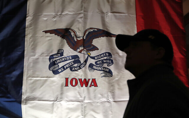 In this March 8, 2019, file photo, an audience member arrives at a rally for a 2020 Democratic presidential candidate at the University of Iowa in Iowa City, Iowa. (AP Photo/Charlie Neibergall, File) In this March 8, 2019, file photo, an audience member arrives at a rally for a 2020 Democratic presidential candidate at the University of Iowa in Iowa City, Iowa. (AP Photo/Charlie Neibergall, File)