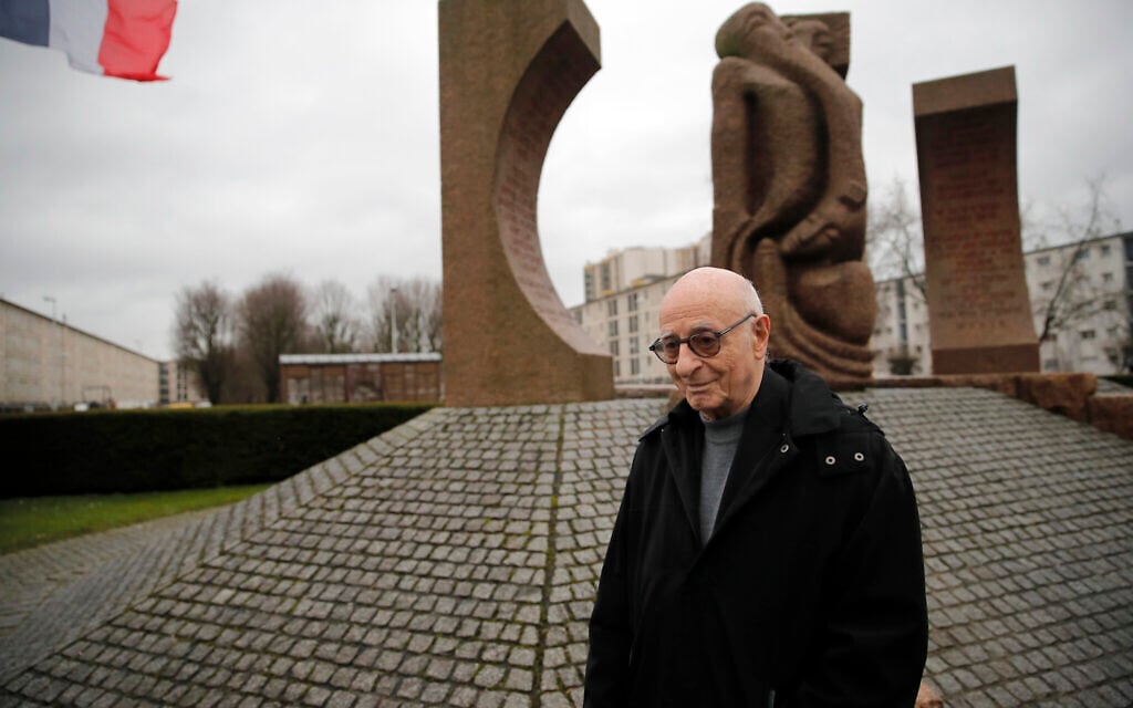 Victor Perahia, who was interned as a child in the Drancy camp and deported to Bergen-Belsen, speaks to students during a workshop dedicated to the Holocaust remembrance at the Drancy Shoah memorial, outside Paris, January 30, 2020 (AP Photo/Christophe Ena) Victor Perahia, who was interned as a child in the Drancy camp and deported to Bergen-Belsen, speaks to students during a workshop dedicated to the Holocaust remembrance at the Drancy Shoah memorial, outside Paris, January 30, 2020 (AP Photo/Christophe Ena)
