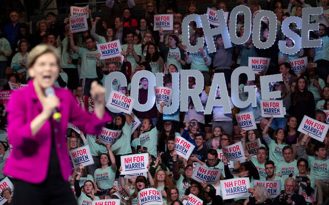 Democratic presidential candidate Sen. Elizabeth Warren of Massachusetts is cheered by her supporters as she speaks during the McIntyre-Shaheen 100 Club Dinner, February 8, 2020, in Manchester, New Hampshire. (AP Photo/Mary Altaffer) Democratic presidential candidate Sen. Elizabeth Warren of Massachusetts is cheered by her supporters as she speaks during the McIntyre-Shaheen 100 Club Dinner, February 8, 2020, in Manchester, New Hampshire. (AP Photo/Mary Altaffer)