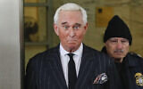 In this Feb. 1, 2019 photo, former campaign adviser for President Donald Trump, Roger Stone, leaves federal court in Washington. (AP Photo/Pablo Martinez Monsivais)
