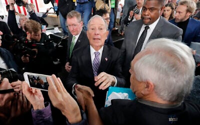 Democratic presidential candidate and former New York City Mayor Mike Bloomberg greets supporters after speaking at a campaign event in Raleigh, N.C., Thursday, Feb. 13, 2020. (AP Photo/Gerald Herbert)