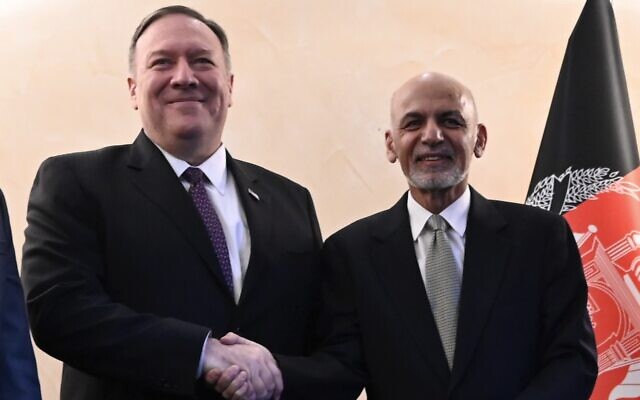 US Secretary of State Mike Pompeo, left, shakes hands with Afghan President Ashraf Ghani,during the 56th Munich Security Conference (MSC) in Munich, southern Germany, on Friday, Feb. 14, 2020. (Andrew Caballero-Reynolds/Pool photo via AP) US Secretary of State Mike Pompeo, left, shakes hands with Afghan President Ashraf Ghani,during the 56th Munich Security Conference (MSC) in Munich, southern Germany, on Friday, Feb. 14, 2020. (Andrew Caballero-Reynolds/Pool photo via AP)
