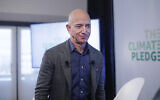 In this Thursday, Sept. 19, 2019 file photo, Amazon CEO Jeff Bezos walks off stage after holding a news conference at the National Press Club in Washington on Monday, Feb. 17, 2020. (AP Photo/Pablo Martinez Monsivais)