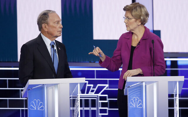 Democratic presidential candidates, former New York City Mayor Mike Bloomberg, left, and Sen. Elizabeth Warren, D-Mass., talk before a Democratic presidential primary debate Wednesday, Feb. 19, 2020, in Las Vegas, hosted by NBC News and MSNBC. (AP Photo/John Locher) Democratic presidential candidates, former New York City Mayor Mike Bloomberg, left, and Sen. Elizabeth Warren, D-Mass., talk before a Democratic presidential primary debate Wednesday, Feb. 19, 2020, in Las Vegas, hosted by NBC News and MSNBC. (AP Photo/John Locher)