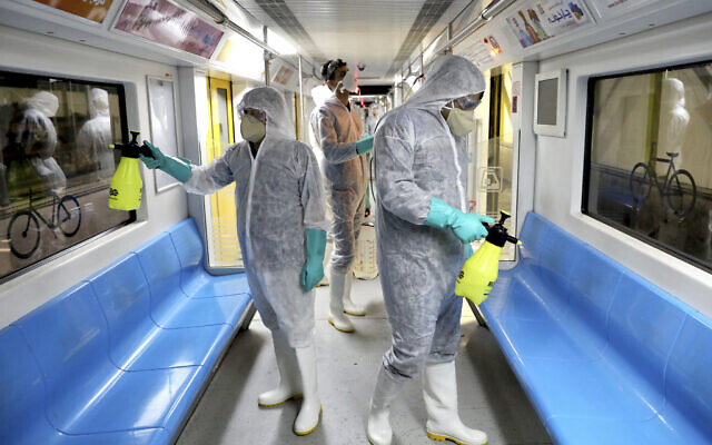 Workers disinfect subway trains against coronavirus in Tehran, Iran, in the early morning of February 26, 2020. (AP Photo/Ebrahim Noroozi) Workers disinfect subway trains against coronavirus in Tehran, Iran, in the early morning of February 26, 2020. (AP Photo/Ebrahim Noroozi)