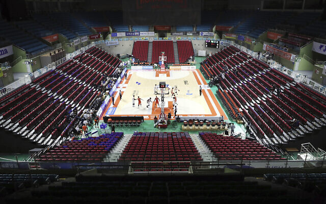 The stadium's seats are empty during the Korean Basketball League between Incheon Electroland Elephants and Anyang KGC clubs in Incheon, South Korea, Wednesday, Feb. 26, 2020. (Yun Tai-hyun/Yonhap via AP) The stadium's seats are empty during the Korean Basketball League between Incheon Electroland Elephants and Anyang KGC clubs in Incheon, South Korea, Wednesday, Feb. 26, 2020. (Yun Tai-hyun/Yonhap via AP)