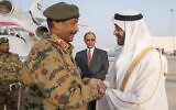 Sheikh Mohamed bin Zayed Al Nahyan, crown prince of Abu Dhabi and deputy supreme commander of the UAE Armed Forces, right, receives Sudanese Gen. Abdel Fattah al-Burhan at the Presidential Airport in Abu Dhabi, United Arab Emirates, May 26, 2019. (Mohamed Al Hammadi/Ministry of Presidential Affairs via AP, File)