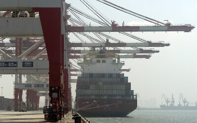 Illustrative: A cargo ship is docked in Yingkou port, in northeastern China's Liaoning Province, July 24, 2019. (Olivia Zhang/AP)