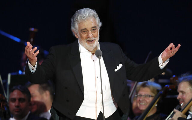 In this August 28, 2019 file photo, opera star Placido Domingo salutes spectators at the end of a concert in Szeged, Hungary (AP Photo/Laszlo Balogh) In this August 28, 2019 file photo, opera star Placido Domingo salutes spectators at the end of a concert in Szeged, Hungary (AP Photo/Laszlo Balogh)