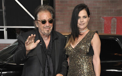Al Pacino, left, and Meital Dohan arrive at the Los Angeles premiere of "The Irishman" on Oct. 24, 2019, at the TCL Chinese Theatre. (Richard Shotwell/Invision/AP)