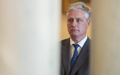 In this January 8, 2020, photo, national security adviser Robert O'Brien, listens as President Donald Trump addresses the nation from the White House on the ballistic missile strike that Iran launched against Iraqi air bases housing US troops in Washington. (AP Photo/Alex Brandon)