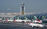 Illustrative: An Emirates jetliner comes in for landing at Dubai International Airport in Dubai, United Arab Emirates. December 11, 2019. (Jon Gambrell/AP)