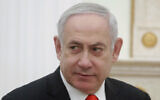 Prime Minister Benjamin Netanyahu listens to Russian President Vladimir Putin during their meeting in the Kremlin in Moscow, Russia, January 30, 2020. (Maxim Shemetov/Pool Photo via AP)
